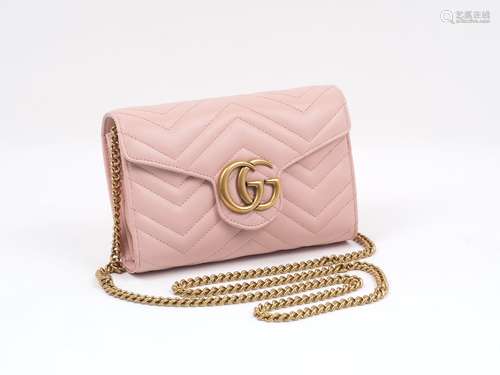 A Gucci Mini Marmont Matelassé shoulder bag, the rectangular form bag with characteristic