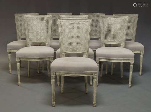 A set of eight Louis XVI style white painted and caned dining chairs, of recent manufacture, the