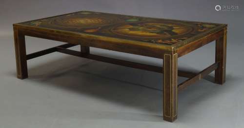 A large reverse printed glass and brass bound coffee table, c.1960, the glass top decorated with