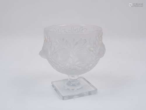 A Lalique pedestal vase, the frosted glass body decorated with birds and foliage, to a square