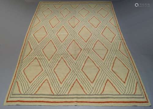 A large Scandinavian wool carpet, mid 20th Century, with all over red and grey geomoetric design