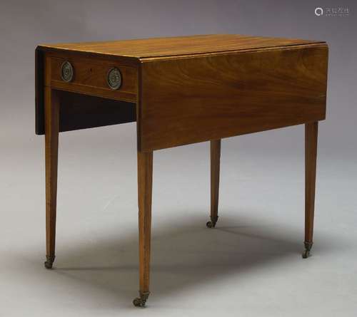 A George III mahogany and line inlaid Pembroke table, with two drop leaves, having one single drawer