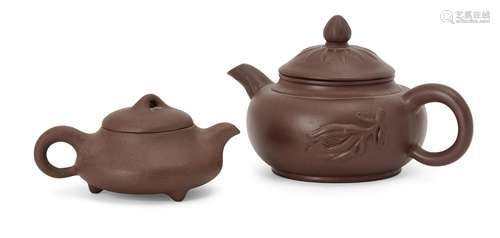 Two Chinese yixing teapots, 20th century, one moulded with a fruiting branch, 12.5cm and 9cm long