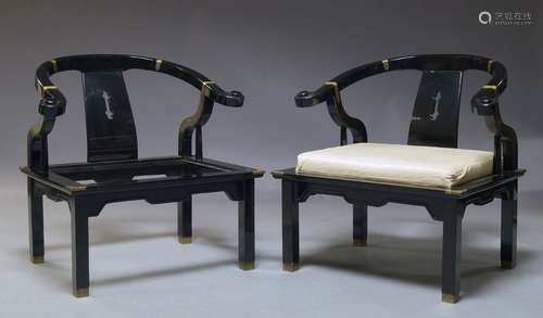 A pair of Chinese black lacquered armchairs, c.1980, with horse shoe backs above rectangular seat