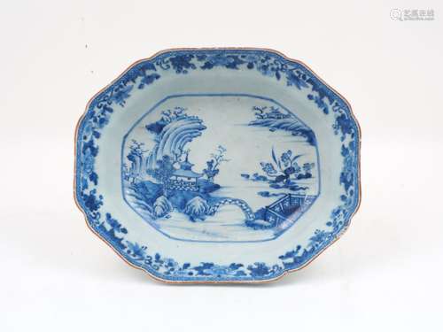 A Chinese export blue and white porcelain dish, early 19th century, decorated in a rural pagoda