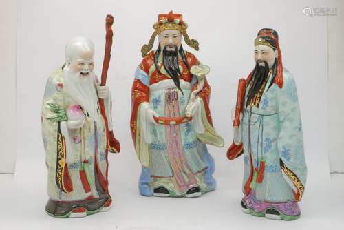 Three Chinese porcelain models of sages, late 20th century, printed and impressed marks to base,