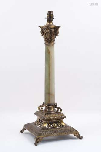 An early 20th century lamp base, designed as a column, the capital of composite form with