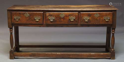 A George III style oak dresser base, late 20th Century incorporating some Georgian elements, with