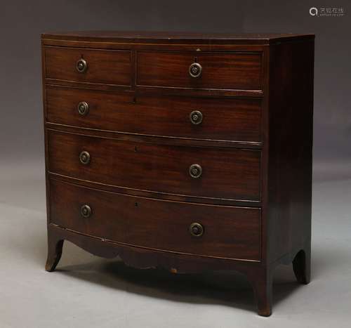 A Regency mahogany bow fronted chest of drawers, with two short over three long graduated drawers,