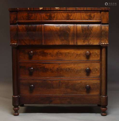 A Victorian flame mahogany chest of drawers, the rectangular top over blind frieze drawer, three