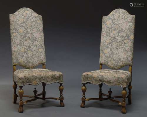 A pair of 17th Century style walnut high back chairs, mid 20th Century, with floral needlework