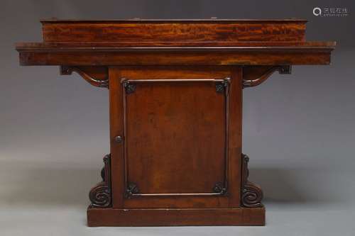 A William IV mahogany sideboard, the rectangular top, with raised back, above long blind frieze