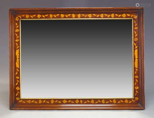 A mahogany and marquetry inlaid overmantle mirror, late 19th Century, the rectangular plate set