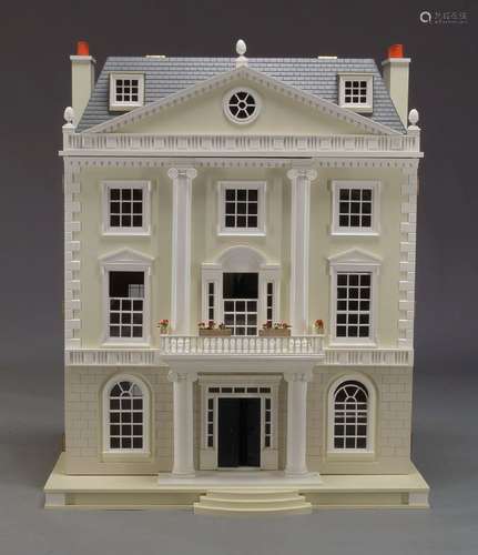 A Georgian Palladian style doll’s house by ‘The Doll’s House Emporium’, retailed by Harrods, to