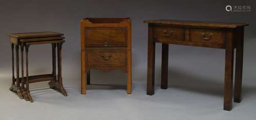 A George III mahogany and ebony strung tray top commode, of square form, the raised edges with