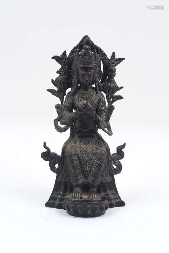 A Chinese bronze Buddha, 19th century, depicting the Buddha Tara, modelled seated, 23.5cm highPlease