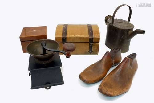 A Kenrick and Sons coffee mill, 21cm high, together with a brass watering can, a leather covered