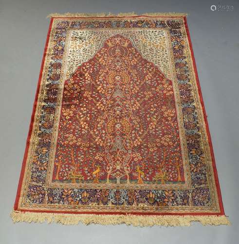 A Tabriz part silk prayer rug, mid to late 20th Century, the Mihrab field with tree of life, with