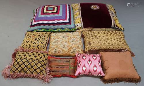 A selection of decorative cushions, of varying sizes and colour ways, to include, two large