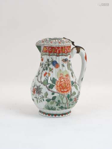 An early 20th century continental chocolate pot and cover, decorated in an all over Chinoiserie