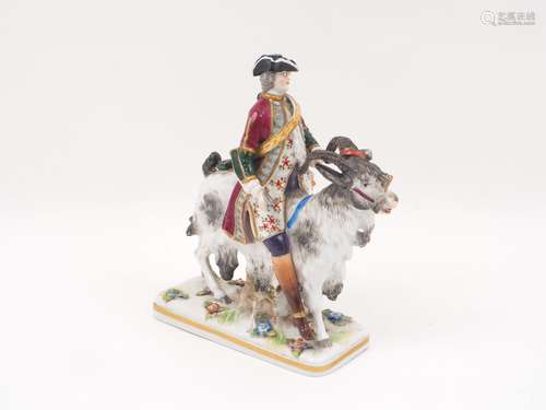 A Capodimonte porcelain figure, 19th century, designed a gentleman riding a goat, to a florally