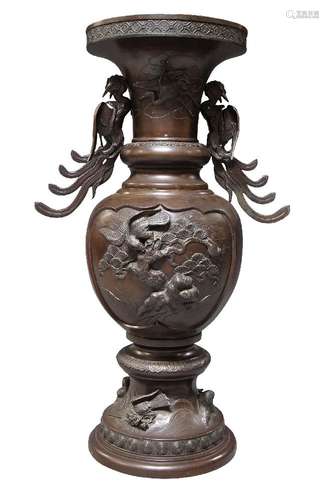 A Japanese bronze three section vase, late 19th/early 20th century, with two ho-o form handles,