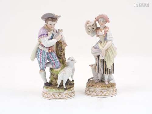 A pair of Augustus Rex porcelain figures of a shepherd and shepherdess, marked to base, 18.5cm