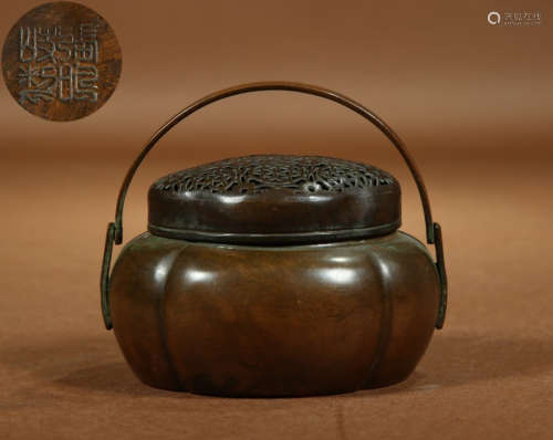 A COPPER CENSER WITH COVER