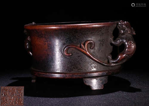 A COPPER CENSER WITH BEAST EARS