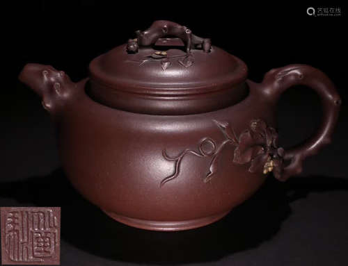 A ZISHA TEA POT CARVED WITH FLOWER