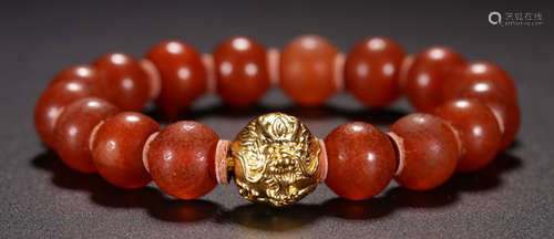 AN OLD AMBER STARING BRACELET WITH 16 BEADS