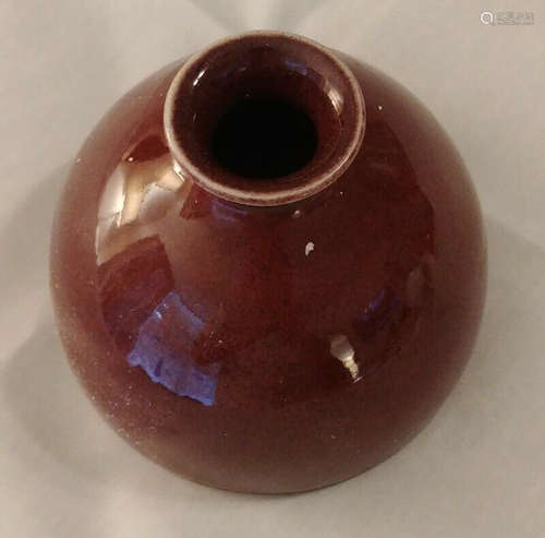 A DARK RED GLAZE TAIBAI ZUN VASE