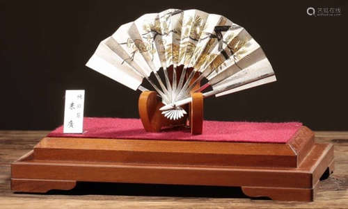 A SILVER FAN WITH BAMBOO PATTERN