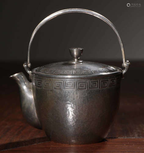 A SILVER POT WITH HANDLE