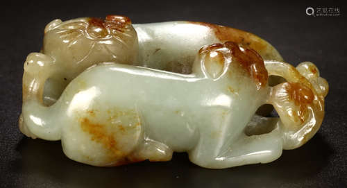 A HETIAN JADE BEAST PENDANT