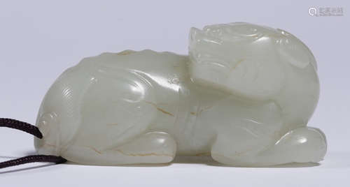 A HETIAN WHITE JADE BEAST PENDANT