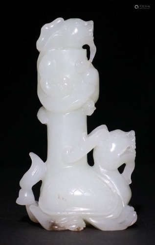 A HETIAN JADE PENDANT CARVED WITH BEAST