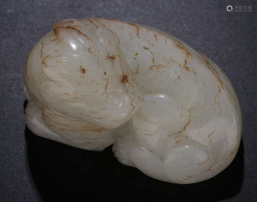 A HETIAN WHITE JADE BEAST PENDANT