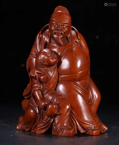 A HUANGYANG WOOD FIGURE STATUE