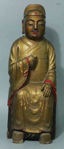 A WOOD FIGURE STATUE