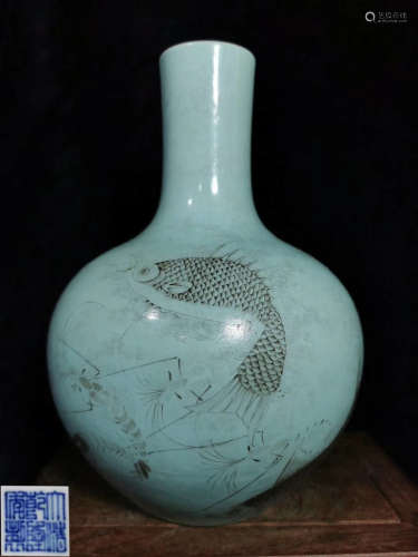 A BLUE GLAZE VASE PAINTED WITH FISH