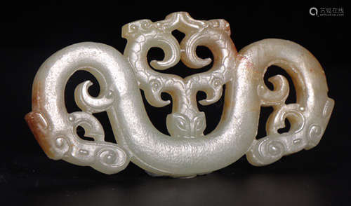 A HETIAN JADE PENDANT CARVED WITH DRAGON