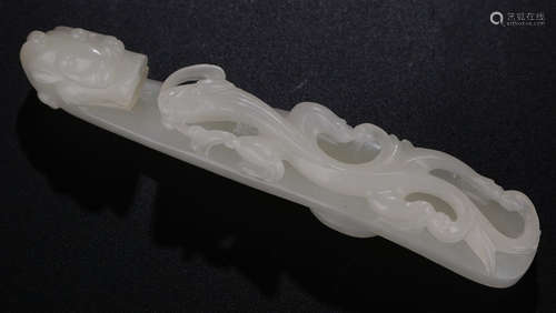 A HETIAN WHITE JADE PENDANT CARVED WITH DRAGON