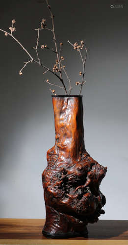 A WOOD VASE NATURE SHAPED