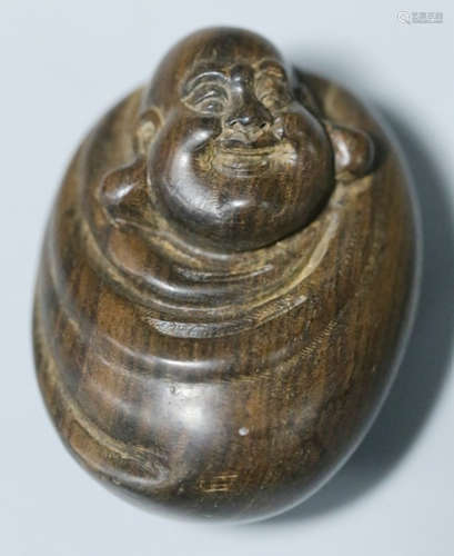 A HUALI WOOD PENDANT CARVED WITH MAITREYA BUDDHA