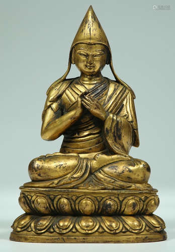 A GILT BRONZE TSONGKAHAPA BUDDHA STATUE