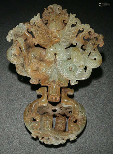 A HETIAN JADE PENDANT CARVED WITH BEAST