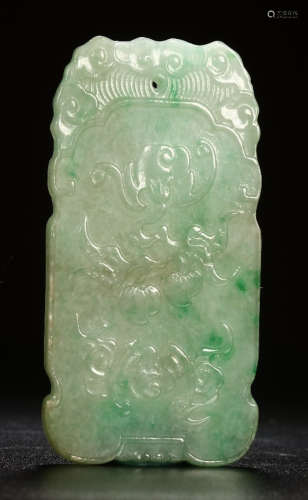 A JADEITE TABLET CARVED WITH AUSPICIOUS PATTERN