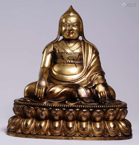 A GILT BRONZE TSONGKAHAPA BUDDHA STATUE