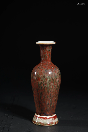 AN ARCHAIC COPPER-RED GLAZED BOTTLE VASE